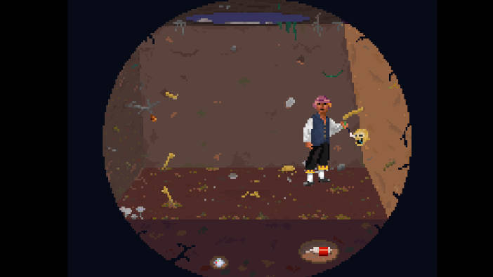El protagonista está dentro de un agujero en el suelo. En las paredes y en el suelo hay huesos humanos.